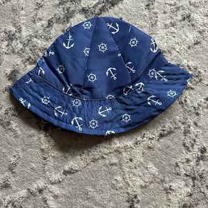 Modern baby sun hat with Velcro strap for chin